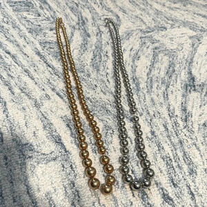 Gold and silver medium weight bauble long necklaces ￼